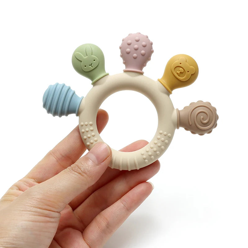 Anneau de dentition à cinq embouts texturés — Coloris pastel