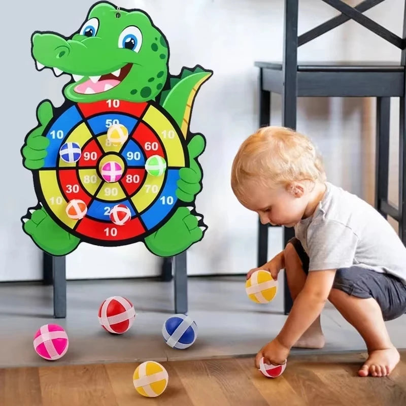 Cible crocodile avec trois balles adhérentes