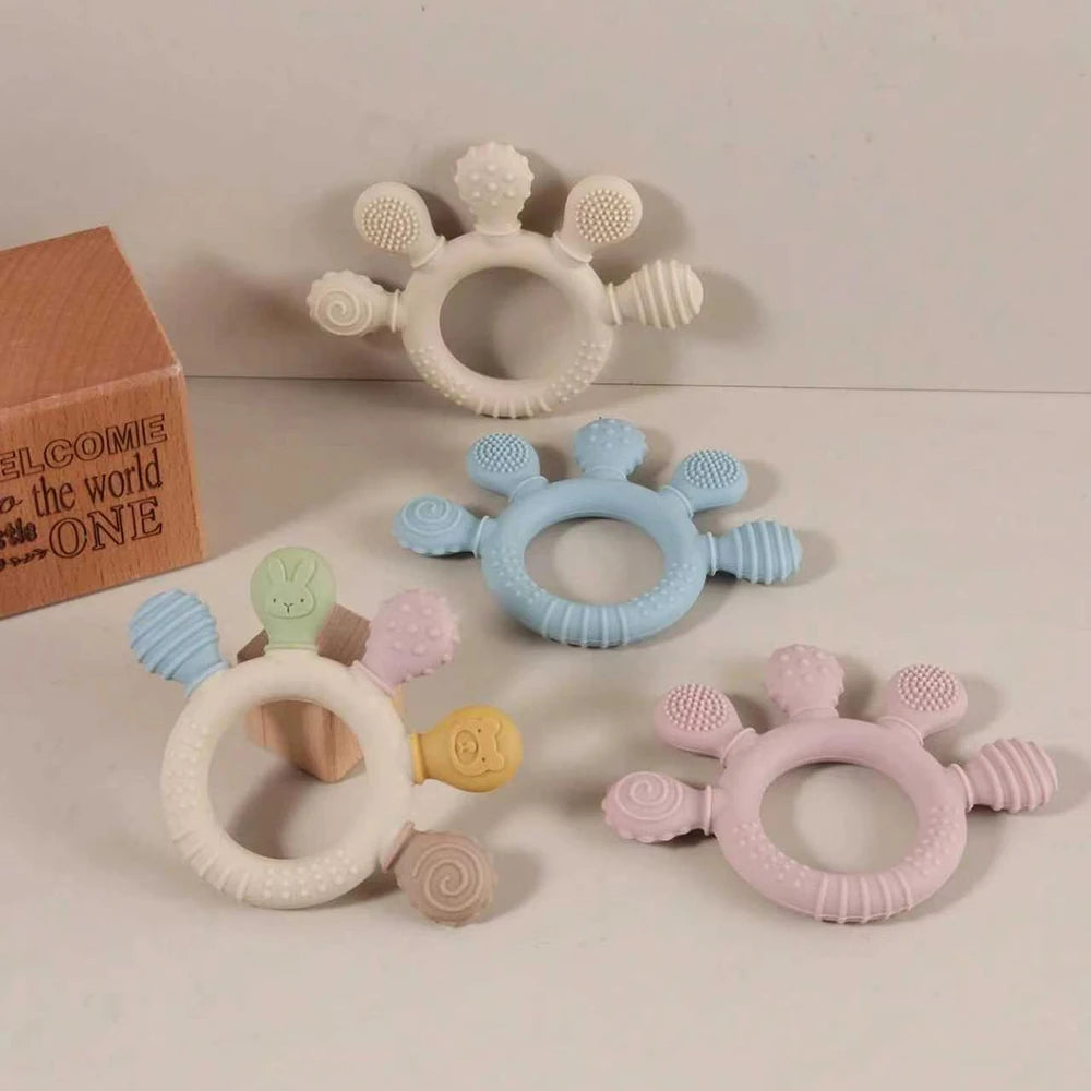 Anneau de dentition à cinq embouts texturés — Coloris pastel