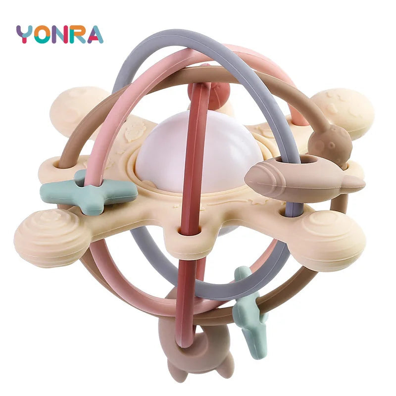 Balle hochet à arceaux — Coloris pastel
