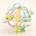 Balle hochet à arceaux — Coloris pastel — Coloris B